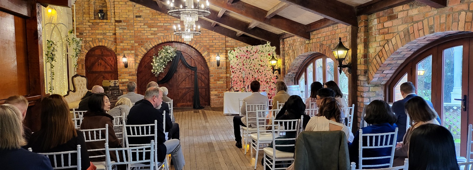 Indoor wedding ceremony at Settlers Country manor Waimauku